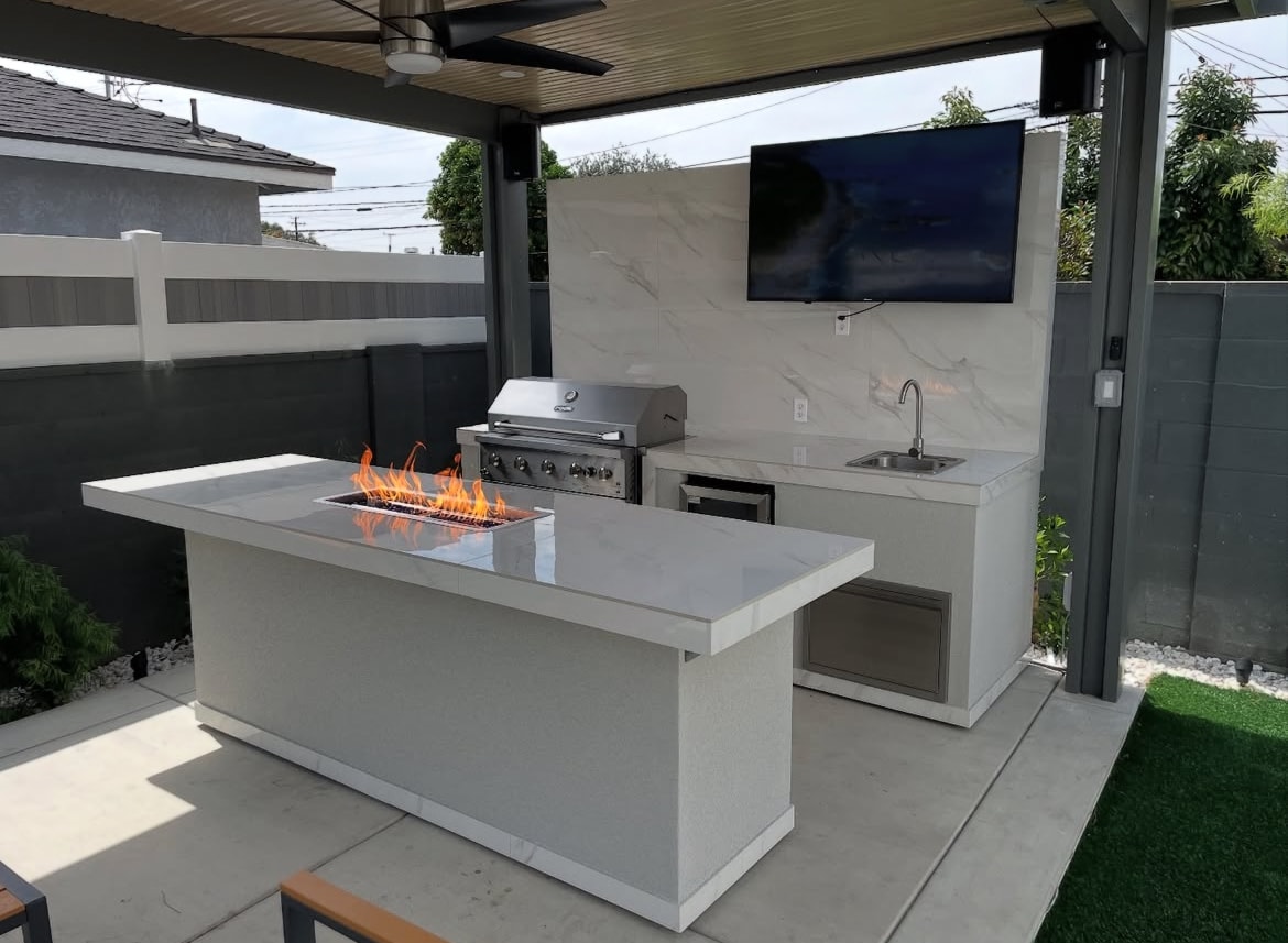 Custom BBQ island with stainless steel appliances